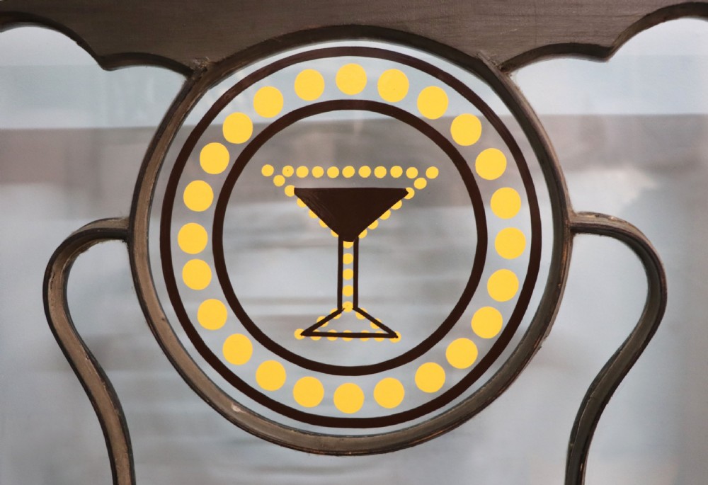 Art Deco period corner display cabinet later sign written for Cocktails. View X