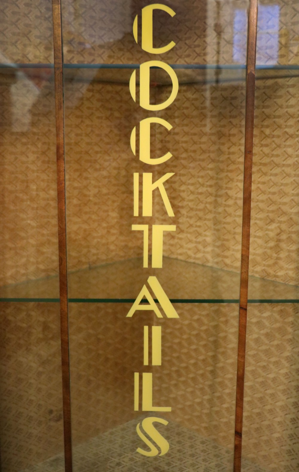 Art Deco period corner display cabinet later sign written for Cocktails. View XVI