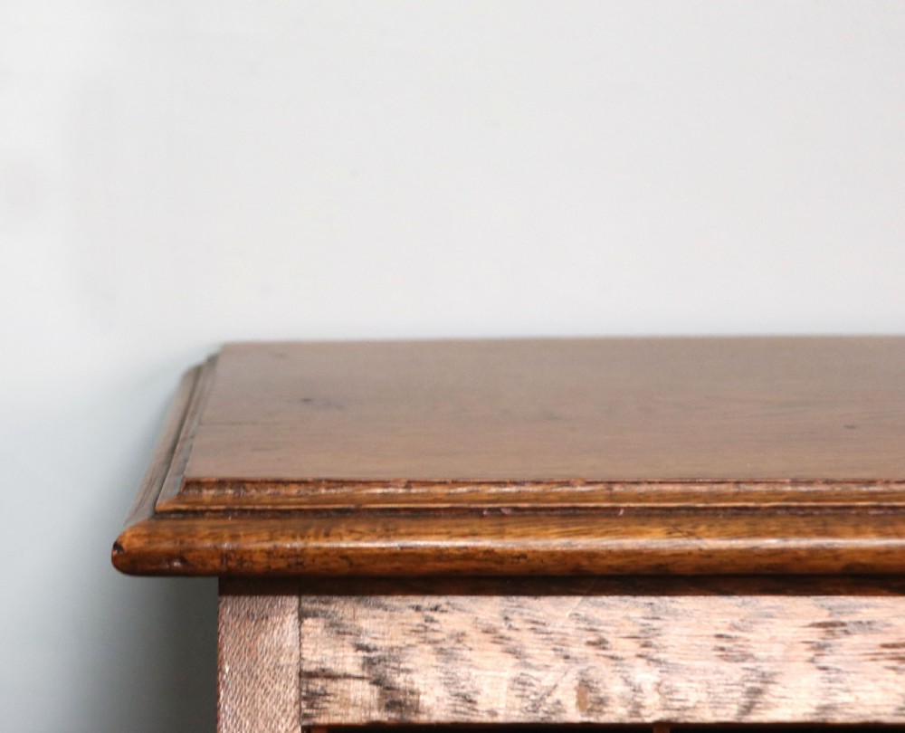 A late Victorian oak bureau in the Arts and Crafts style.  View XII