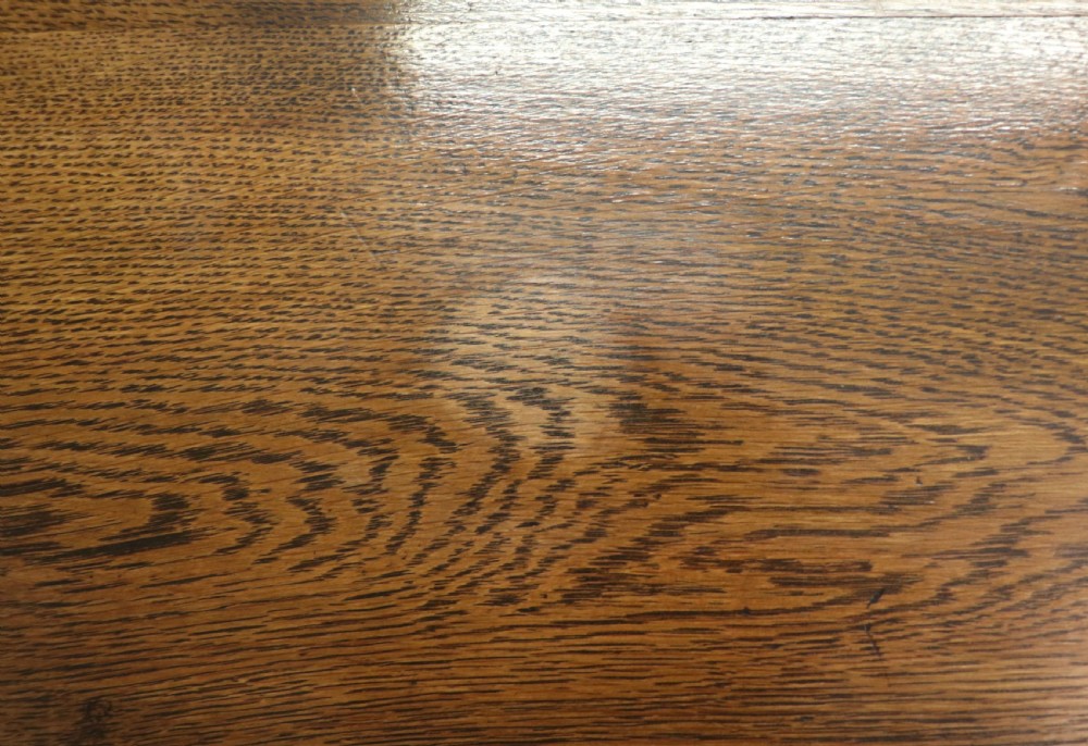 A late Victorian oak bureau in the Arts and Crafts style.  View XVII