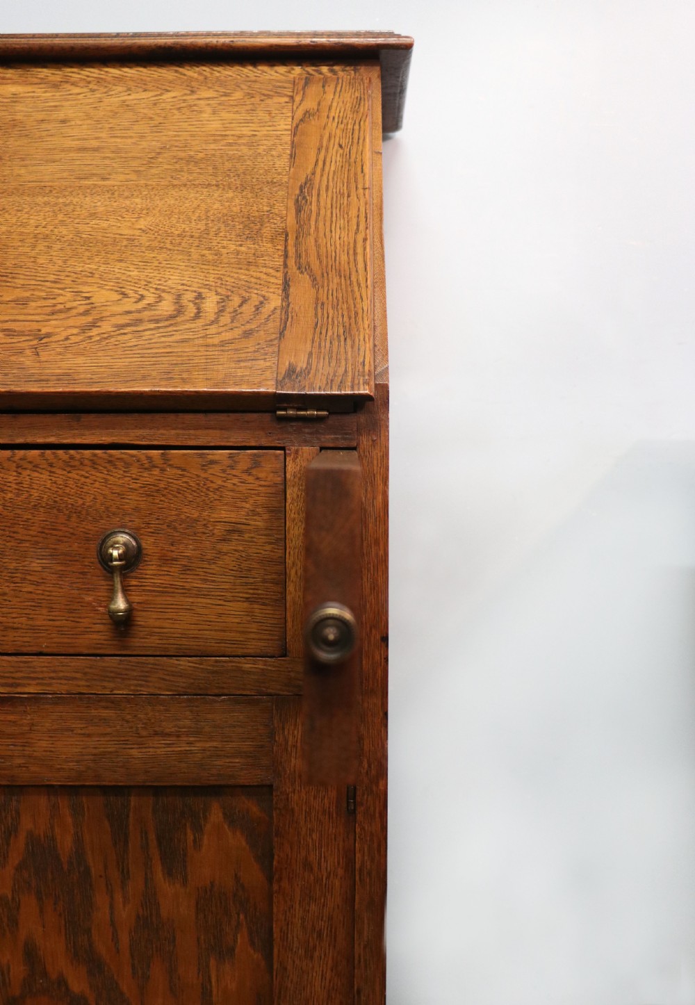 A late Victorian oak bureau in the Arts and Crafts style.  View XIX