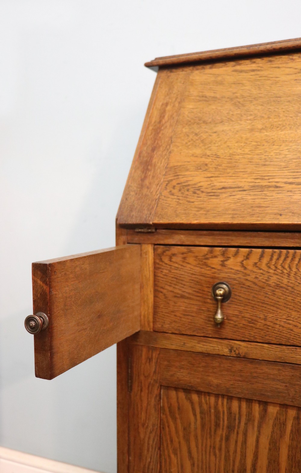A late Victorian oak bureau in the Arts and Crafts style.  View XX