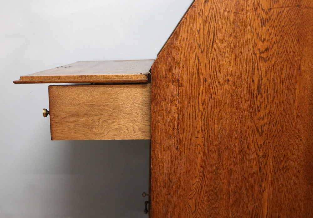 A late Victorian oak bureau in the Arts and Crafts style.  View XXI