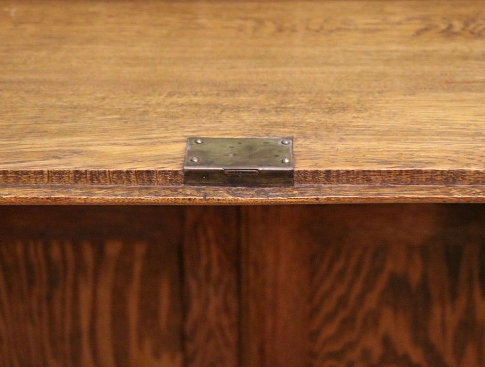 A late Victorian oak bureau in the Arts and Crafts style.  View XXIV