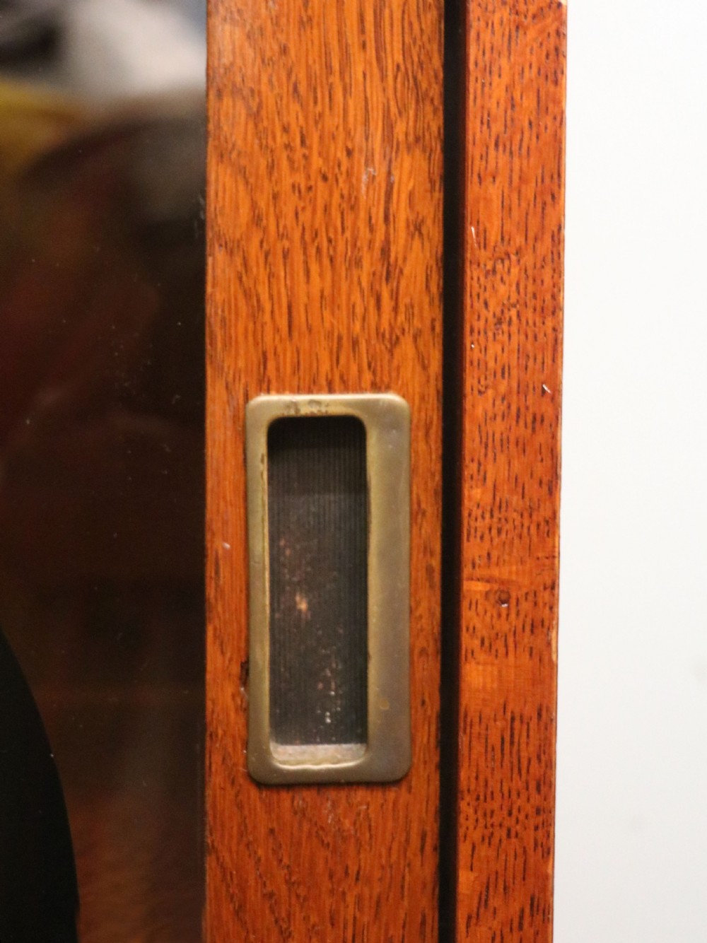 A lovely early 20th century oak framed display cabinet sign written for Singer Sewing Machines. View XXI