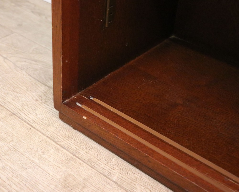 A lovely early 20th century oak framed display cabinet sign written for Singer Sewing Machines. View XXIII