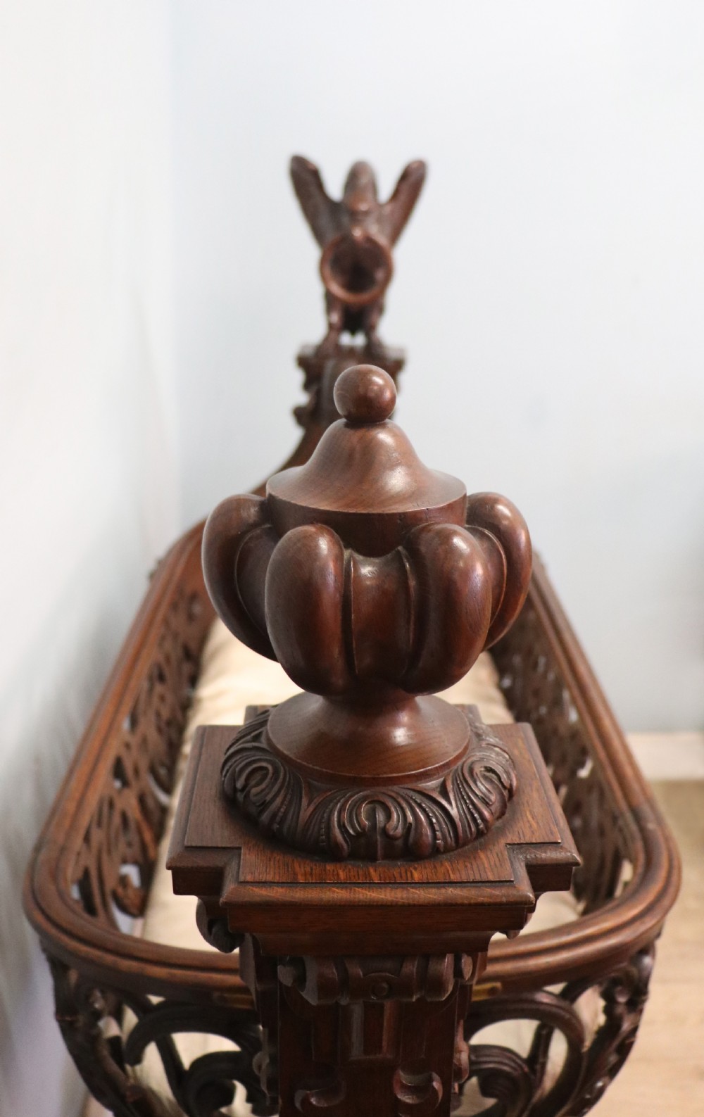 A lovely Victorian rocking baby’s crib with the finest elaborate pierced fretwork oak frame. View X