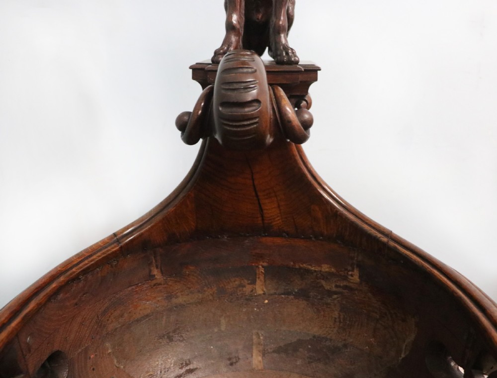 A lovely Victorian rocking baby’s crib with the finest elaborate pierced fretwork oak frame. View XXIX