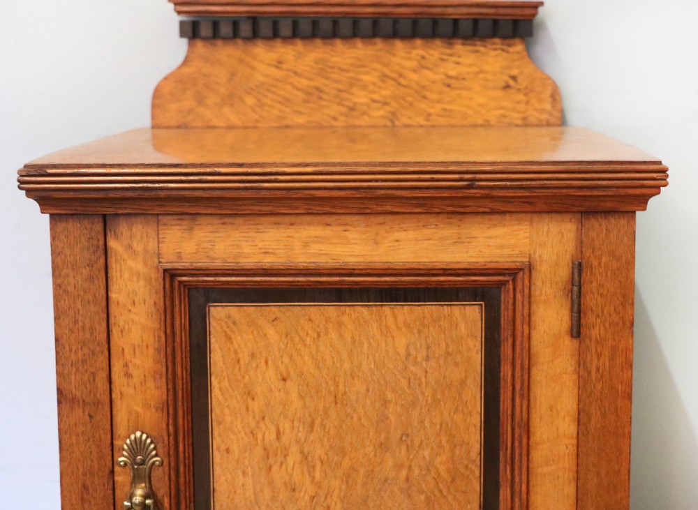 A lovely Shapland & Petter oak inlaid bedside cabinet. View XIV