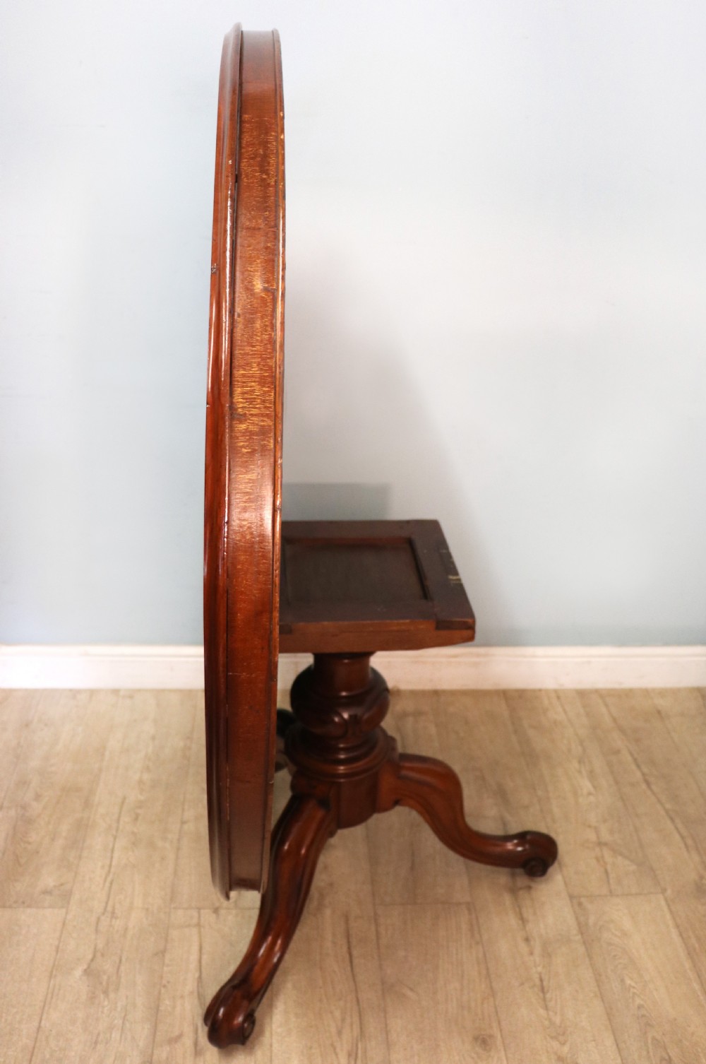 A lovely mahogany tilt top centre or dining table. View V