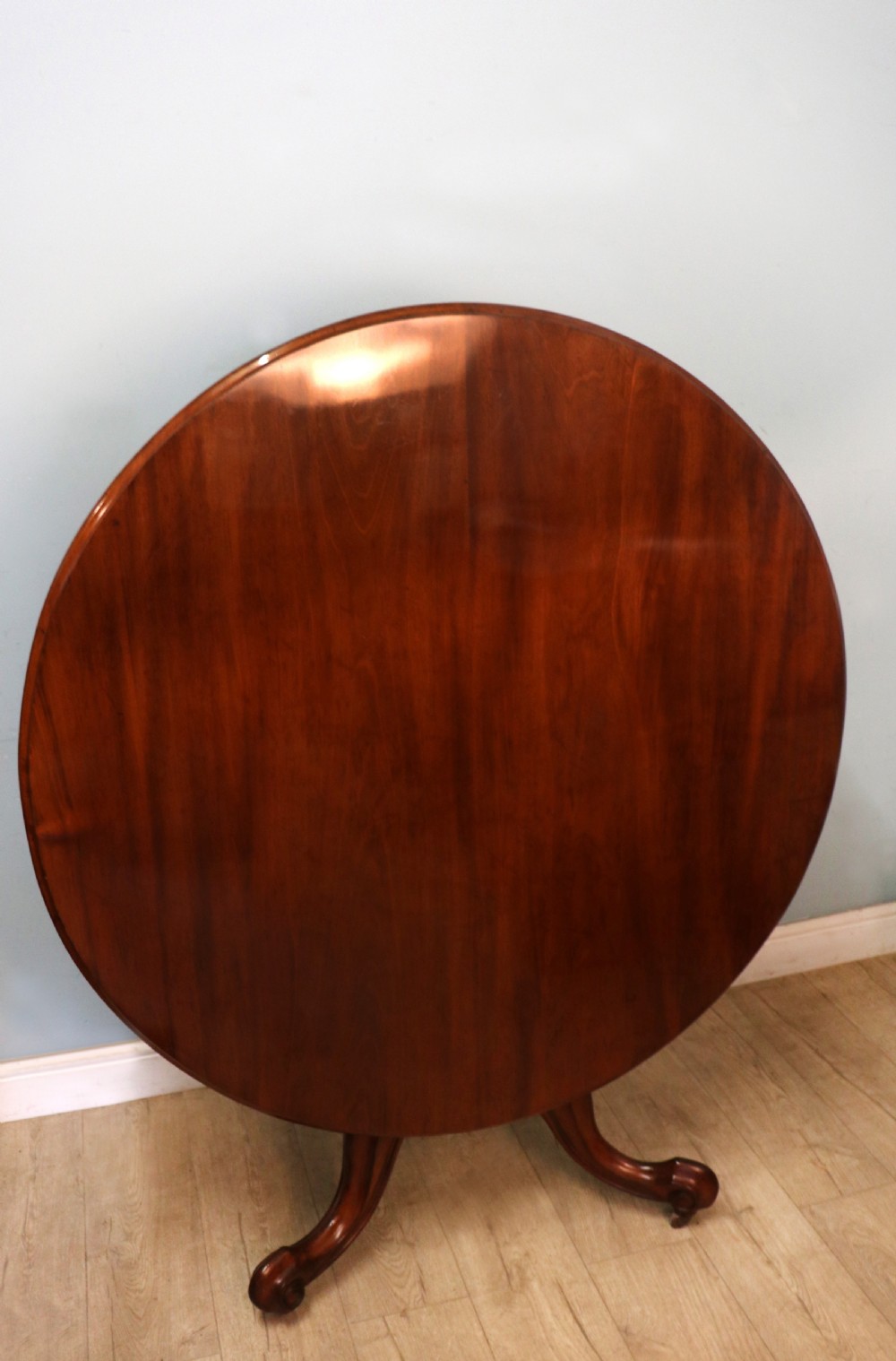A lovely mahogany tilt top centre or dining table. View VII
