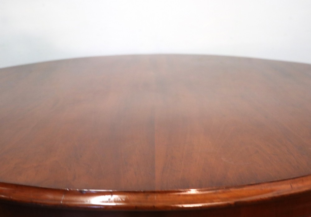 A lovely mahogany tilt top centre or dining table. View IX