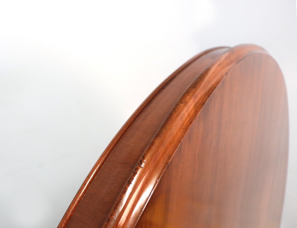 A lovely mahogany tilt top centre or dining table. View X