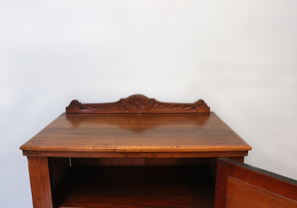 A late Victorian American walnut cabinet, later sign written for G.Hall of London. View VII