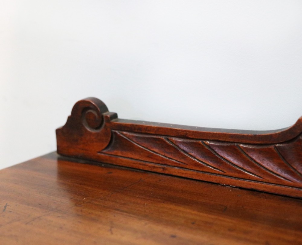A late Victorian American walnut cabinet, later sign written for G.Hall of London. View VIII