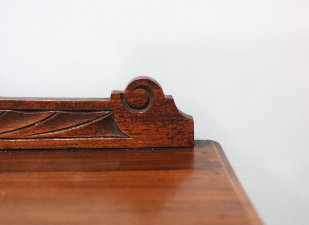 A late Victorian American walnut cabinet, later sign written for G.Hall of London. View XI