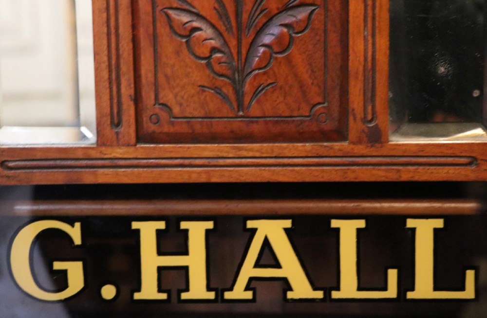 A late Victorian American walnut cabinet, later sign written for G.Hall of London. View XIII