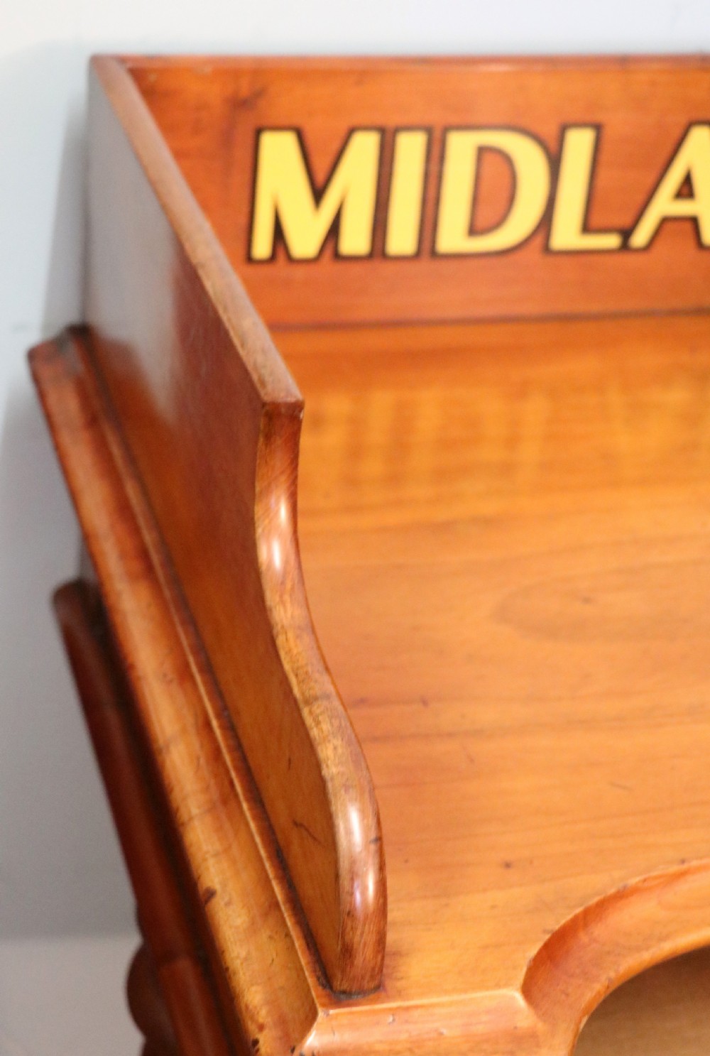 A Victorian mahogany console table with turned legs, a low gallery back, and yellow painted lettering reading Midland Grand Hotel Room 101. View VII