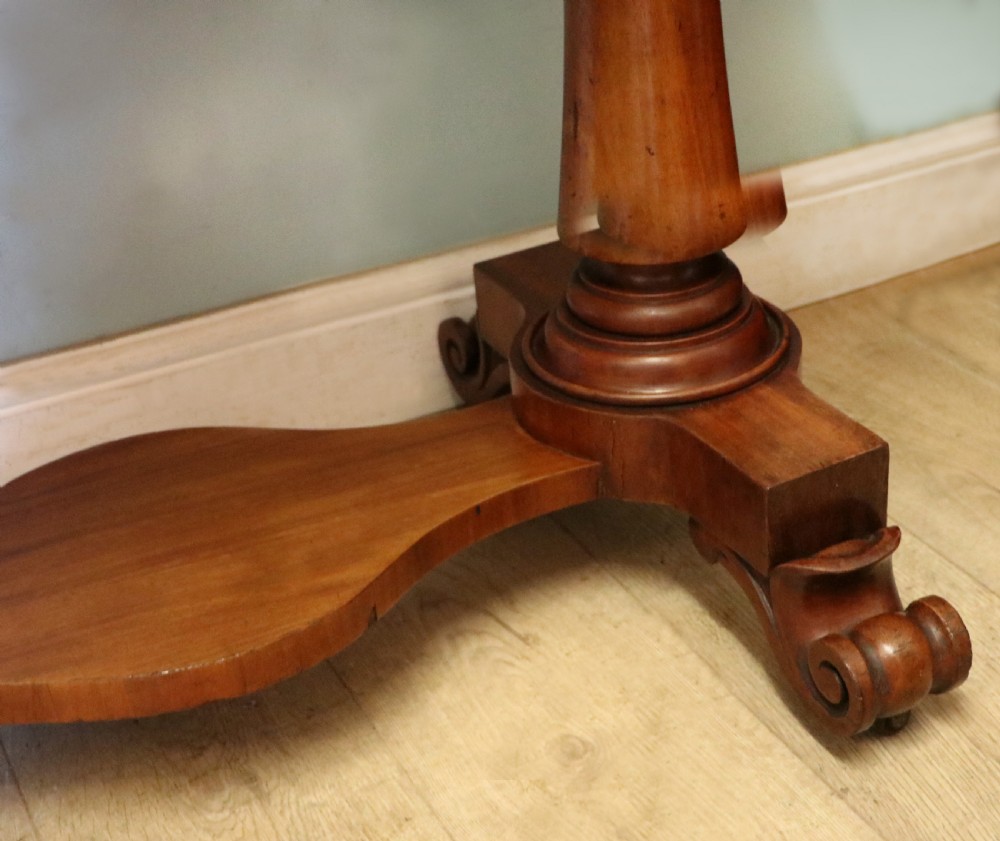A Victorian mahogany console table with turned legs, a low gallery back, and yellow painted lettering reading Midland Grand Hotel Room 101. View XXIII
