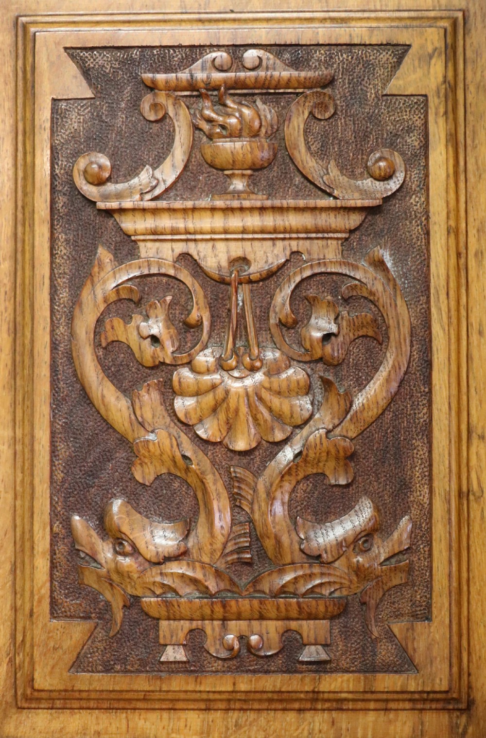 A late nineteenth-century American walnut compendium wardrobe featuring a full-length mirrored door, carved timber motif panel, open side shelving, brass handles, and integrated drawers. View XI