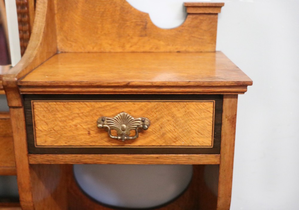  A very high-quality Shapland & Petter late 19th century American walnut dressing table. View V