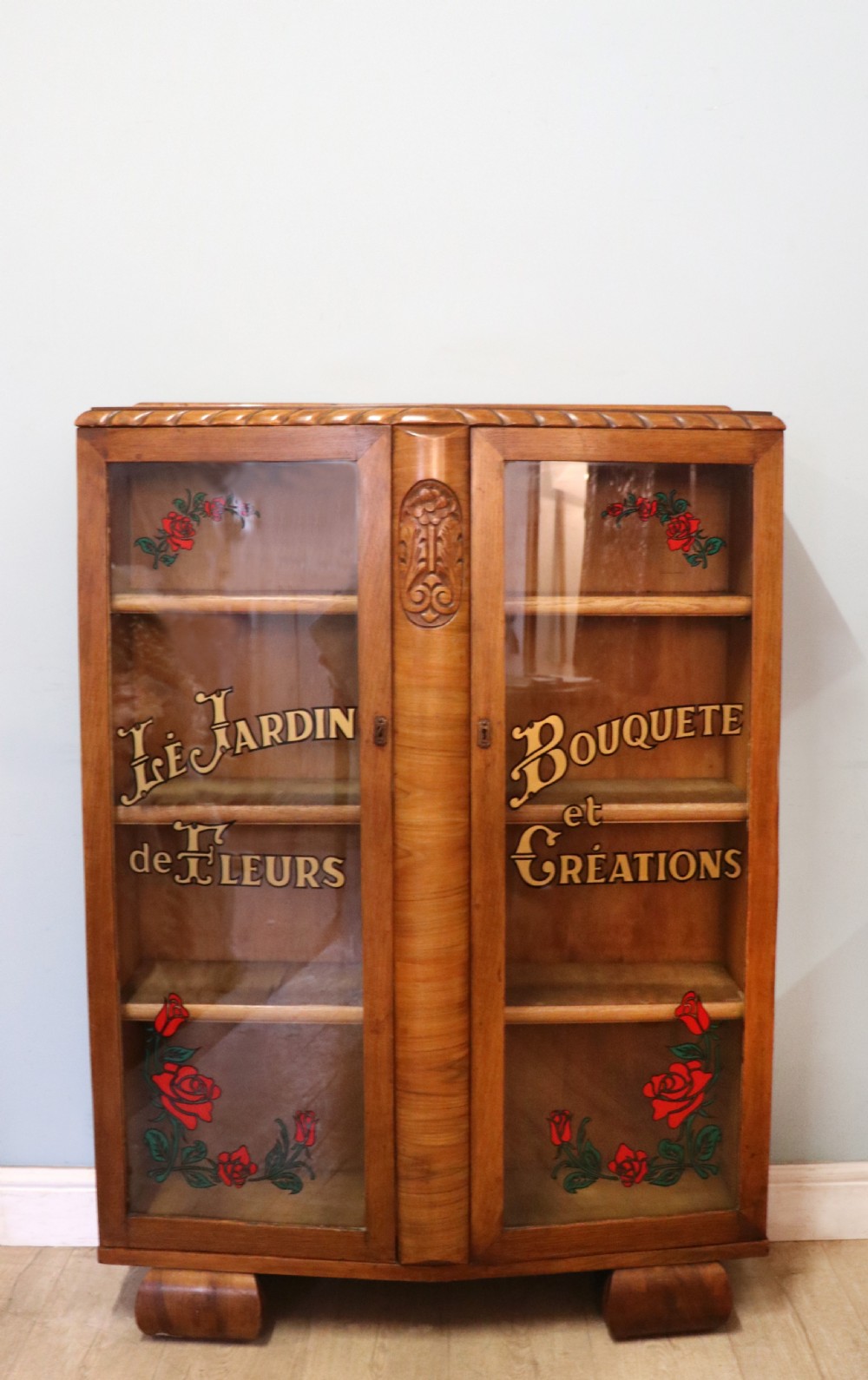 A lovely oak framed and walnut veneered bookcase cabinet. View II