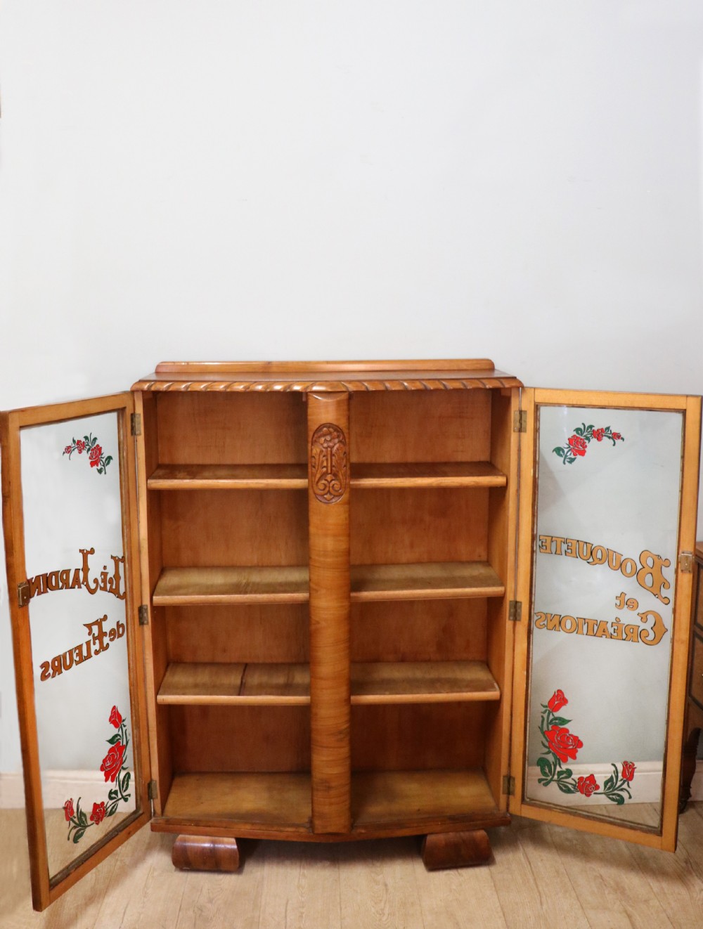 A lovely oak framed and walnut veneered bookcase cabinet. View III