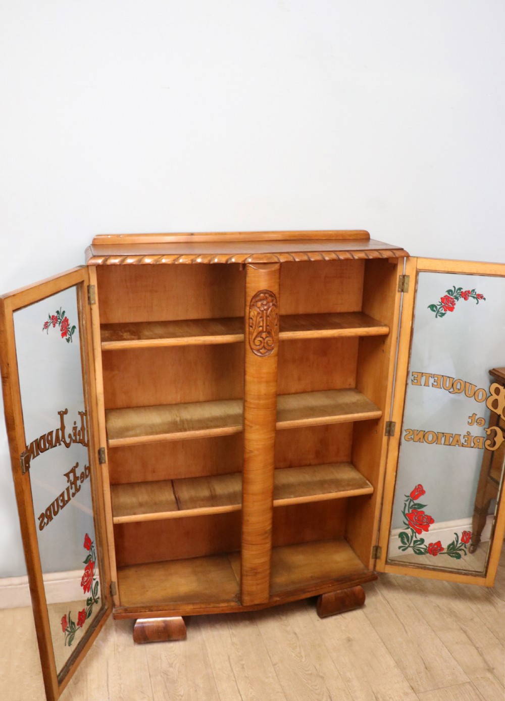 A lovely oak framed and walnut veneered bookcase cabinet. View V