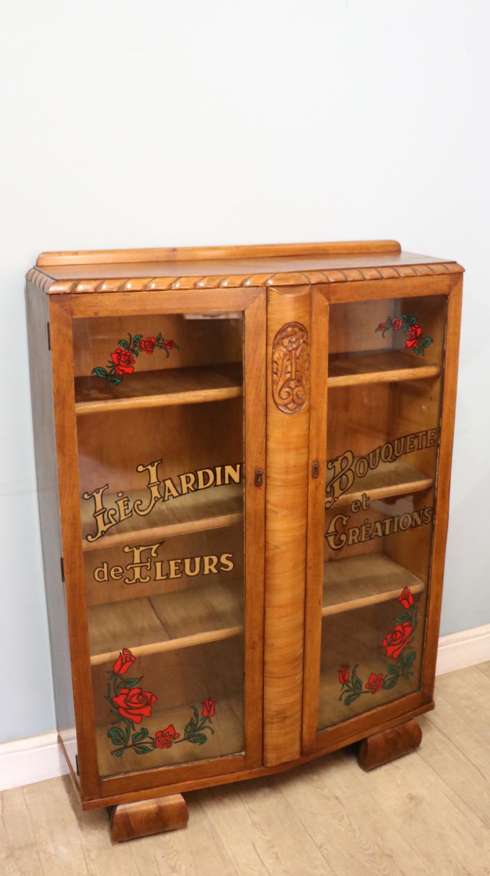 A lovely oak framed and walnut veneered bookcase cabinet. View VI