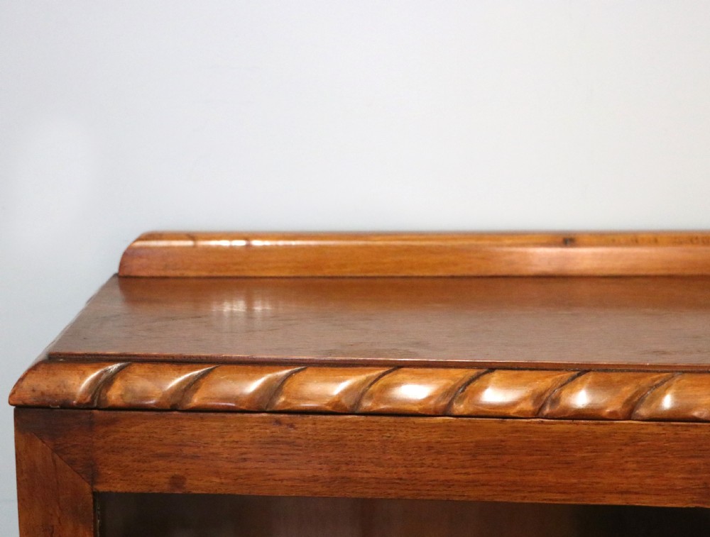 A lovely oak framed and walnut veneered bookcase cabinet. View XIV