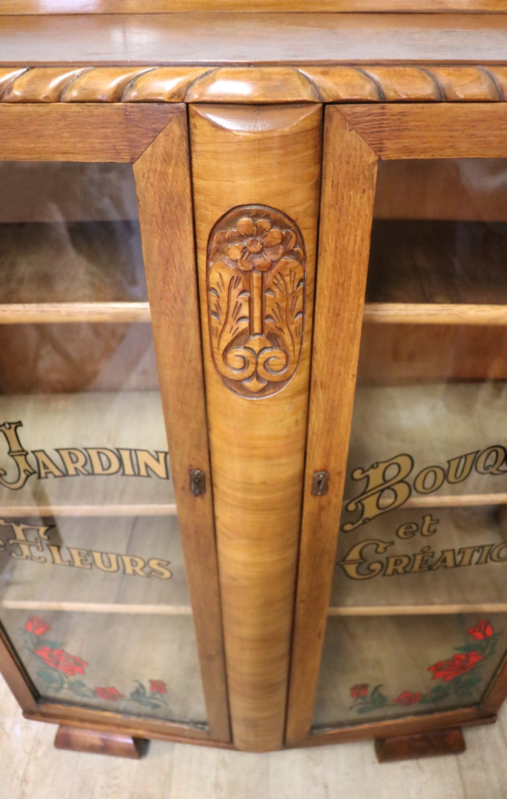 A lovely oak framed and walnut veneered bookcase cabinet. View XVII