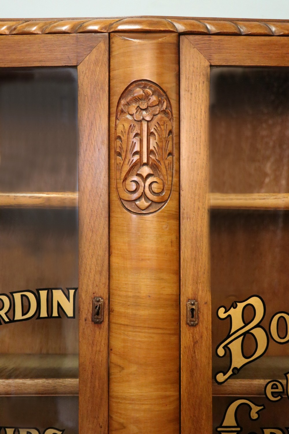 A lovely oak framed and walnut veneered bookcase cabinet. View XVIII