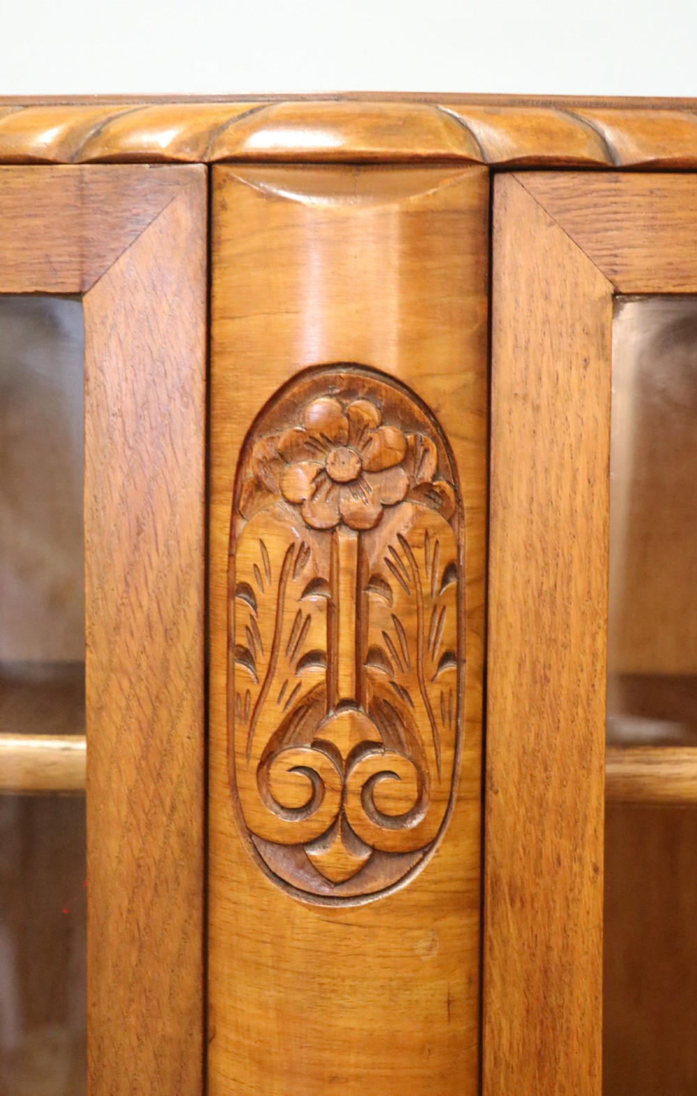 A lovely oak framed and walnut veneered bookcase cabinet. View XIX