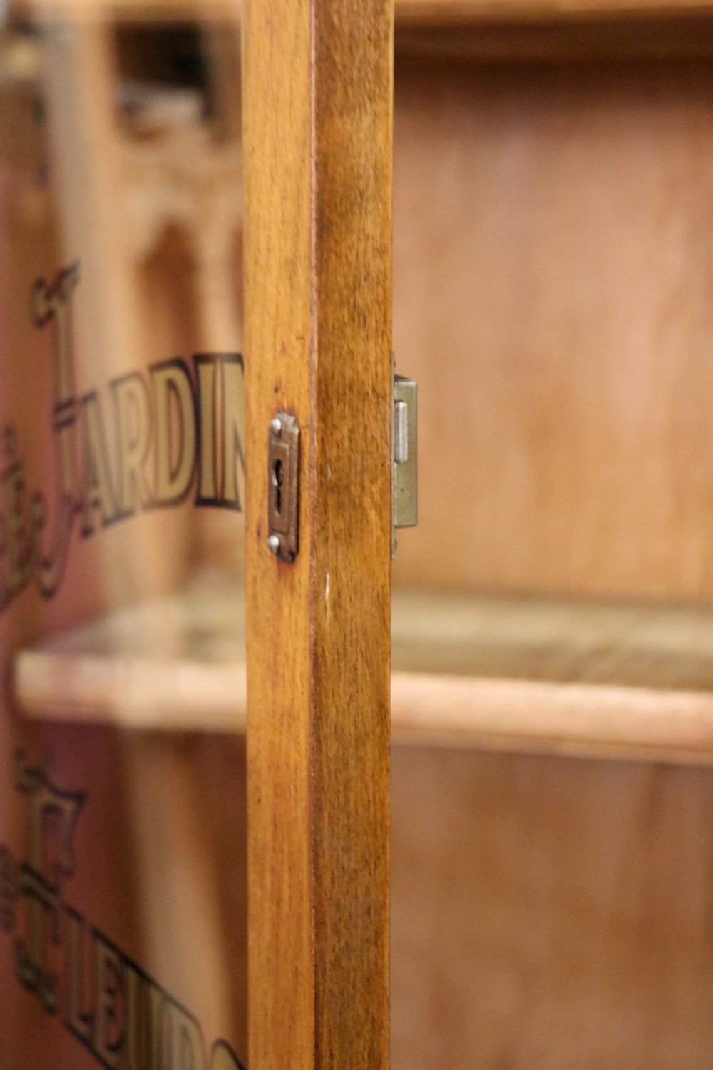 A lovely oak framed and walnut veneered bookcase cabinet. View XXV