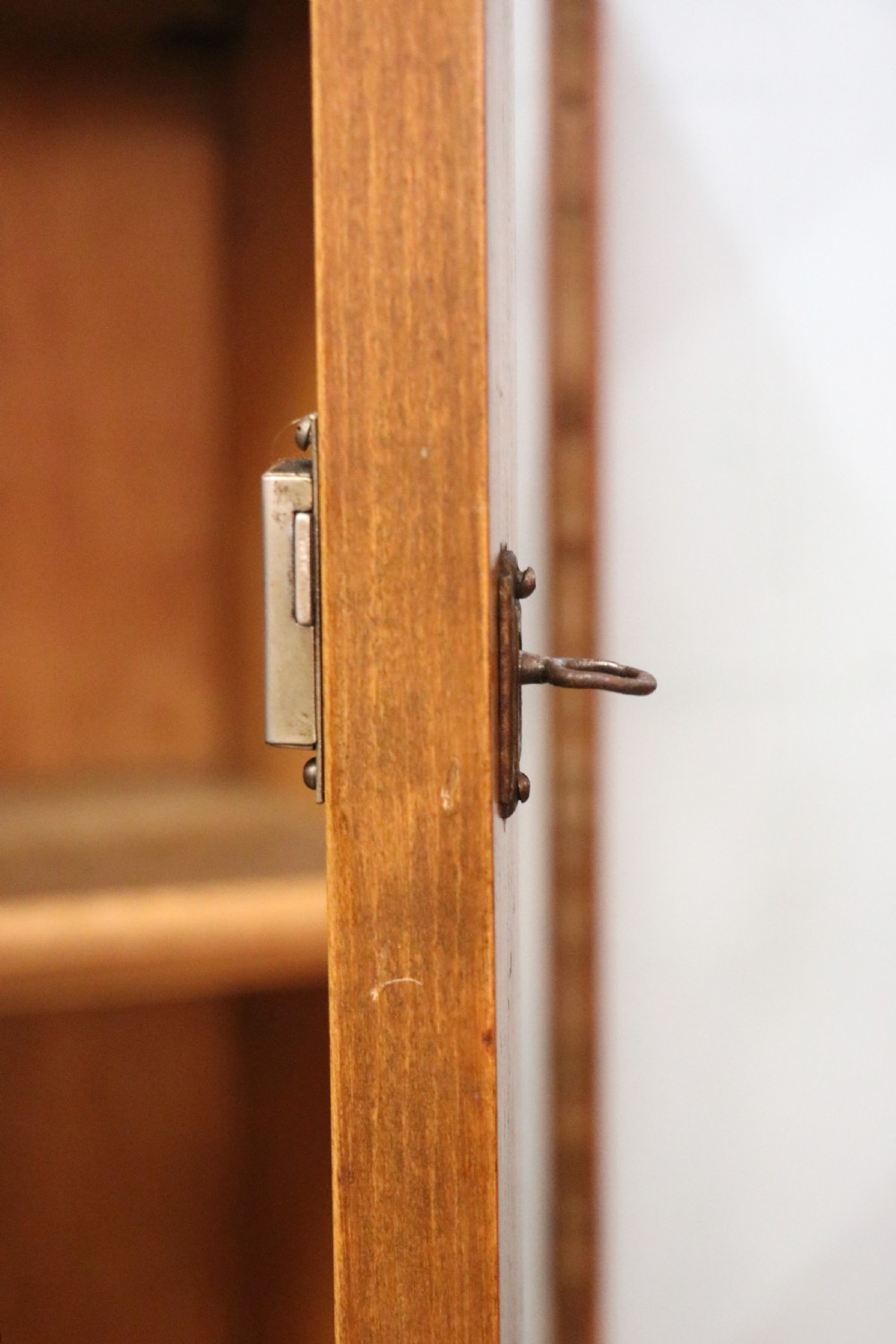A lovely oak framed and walnut veneered bookcase cabinet. View XXVI
