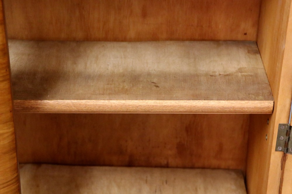 A lovely oak framed and walnut veneered bookcase cabinet. View XXIX
