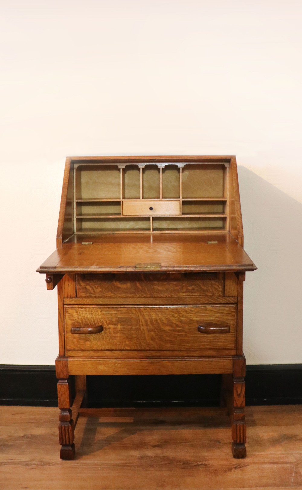 A lovely 1930s golden oak bureau.  View III