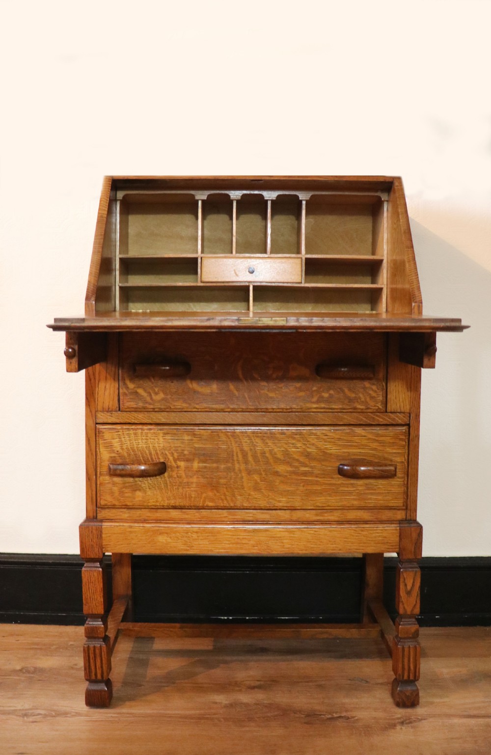 A lovely 1930s golden oak bureau.  View IV