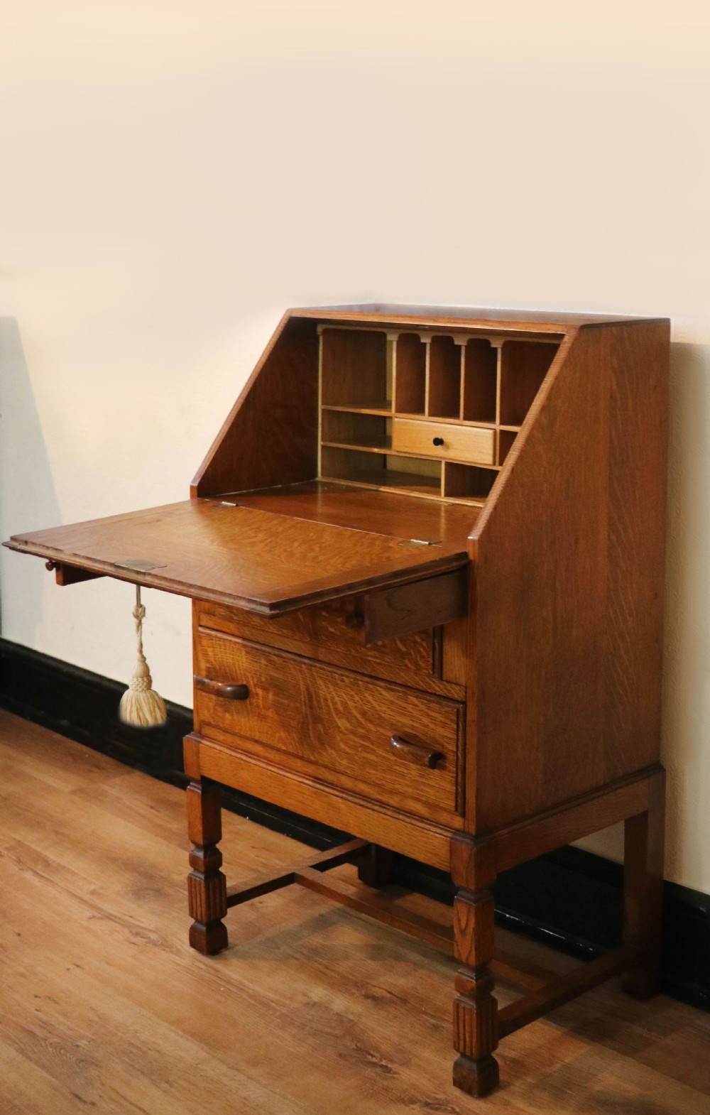 A lovely 1930s golden oak bureau.  View V