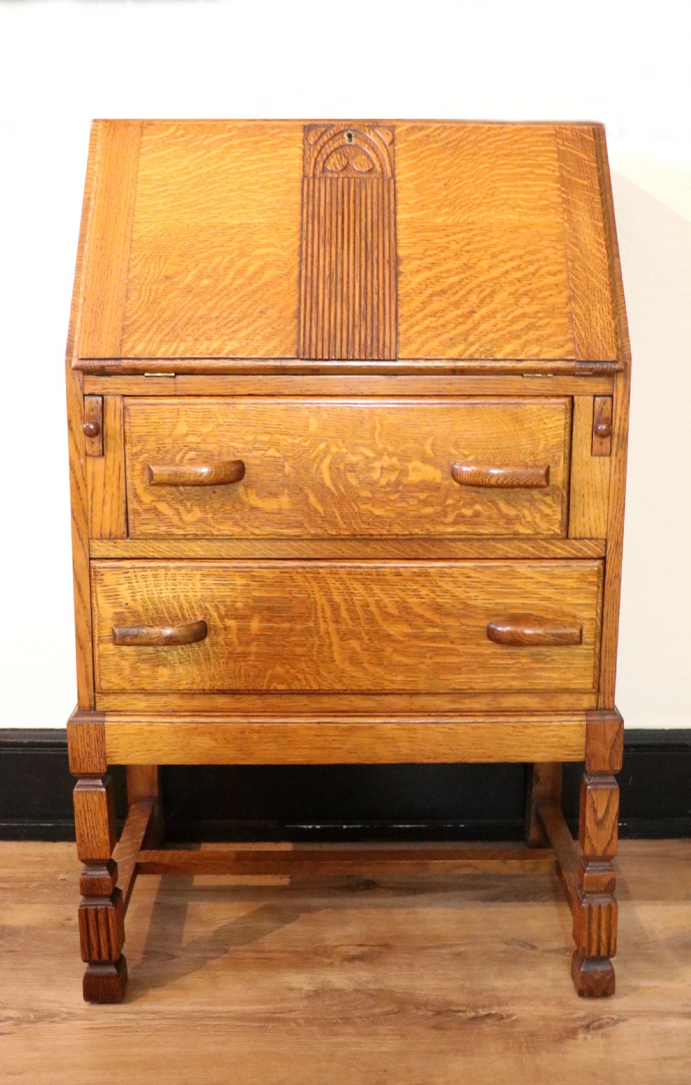 A lovely 1930s golden oak bureau.  View VI