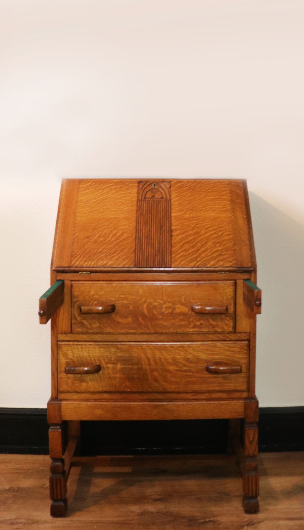A lovely 1930s golden oak bureau.  View VII