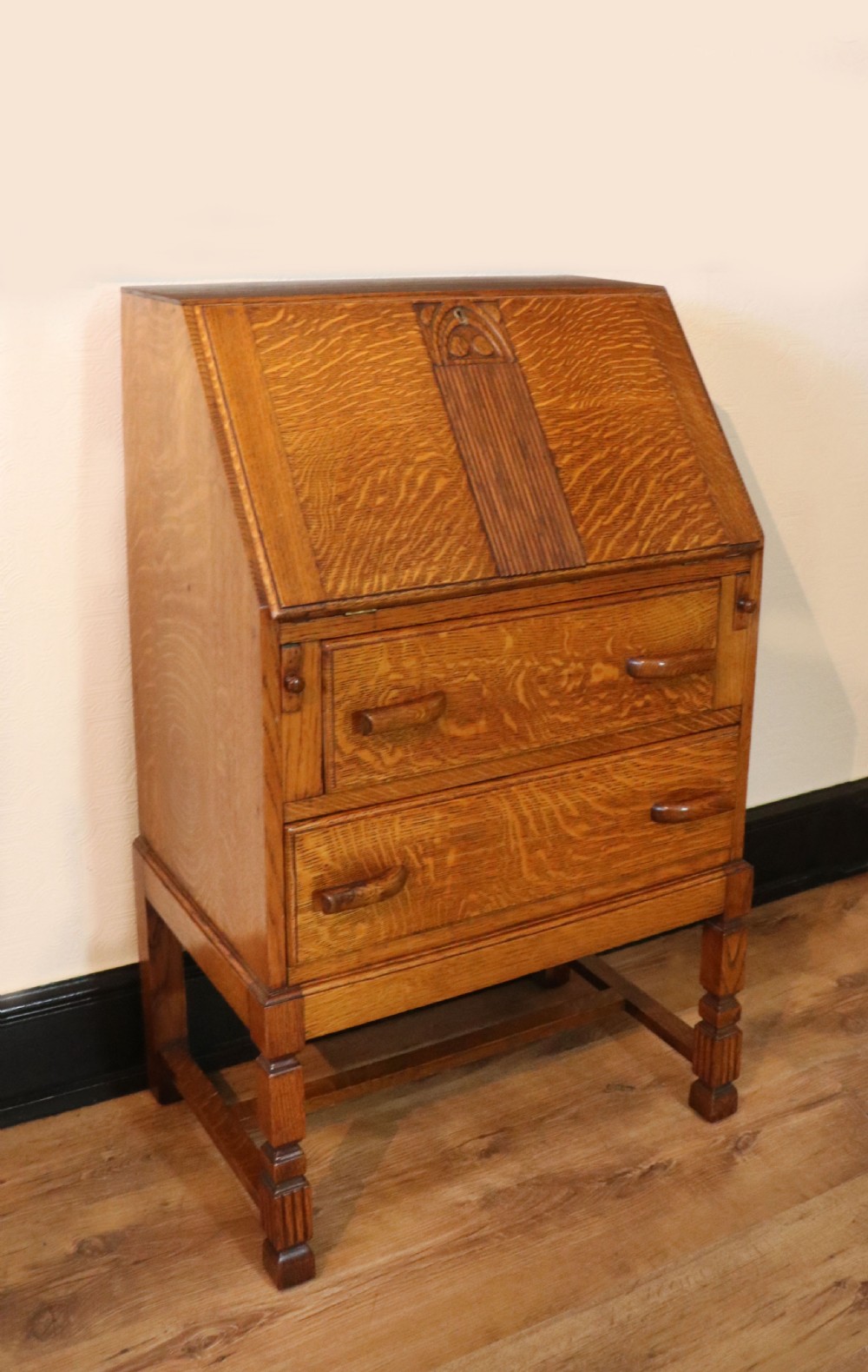 A lovely 1930s golden oak bureau.  View IX