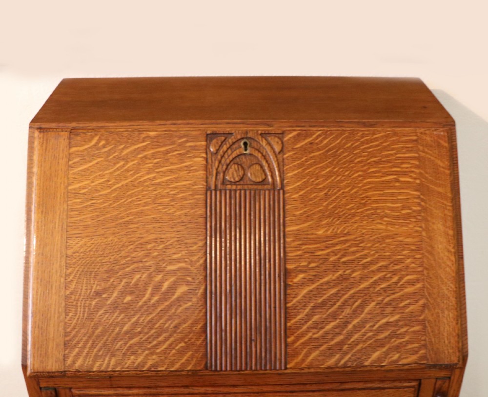A lovely 1930s golden oak bureau.  View X