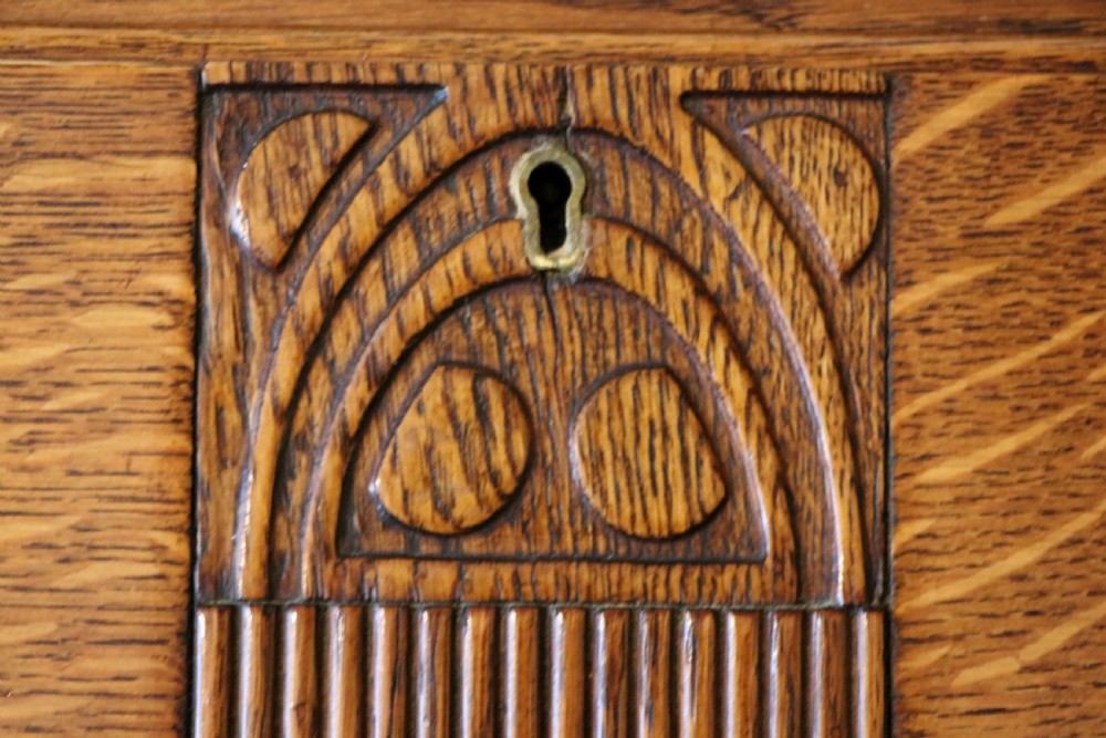 A lovely 1930s golden oak bureau.  View XIII