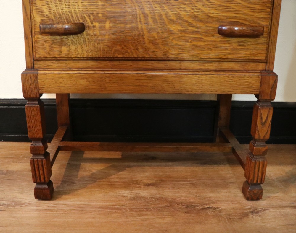 A lovely 1930s golden oak bureau.  View XXVII
