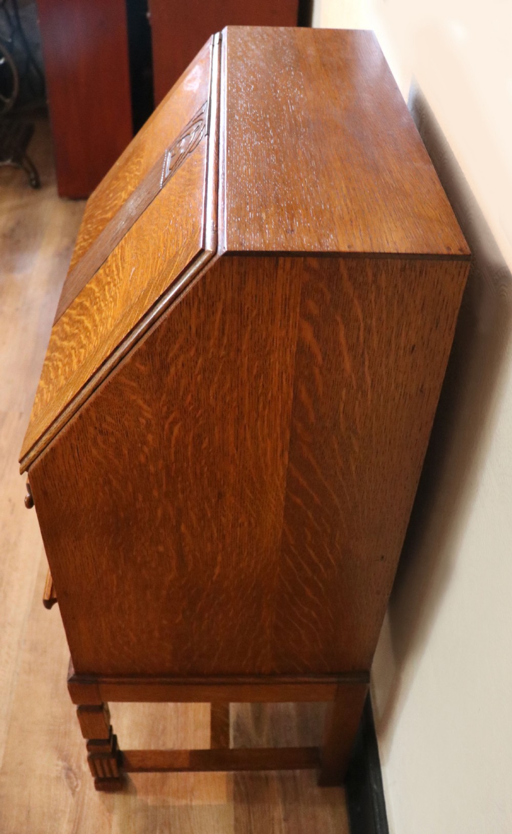 A lovely 1930s golden oak bureau.  View XXVIII