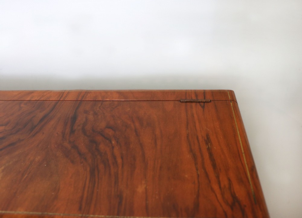 A wonderfully stylish piece of retro furniture An Art Deco walnut and chinoiserie-decorated cabinet by Rivington.  View VII