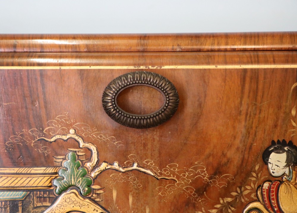 A wonderfully stylish piece of retro furniture An Art Deco walnut and chinoiserie-decorated cabinet by Rivington.  View IX