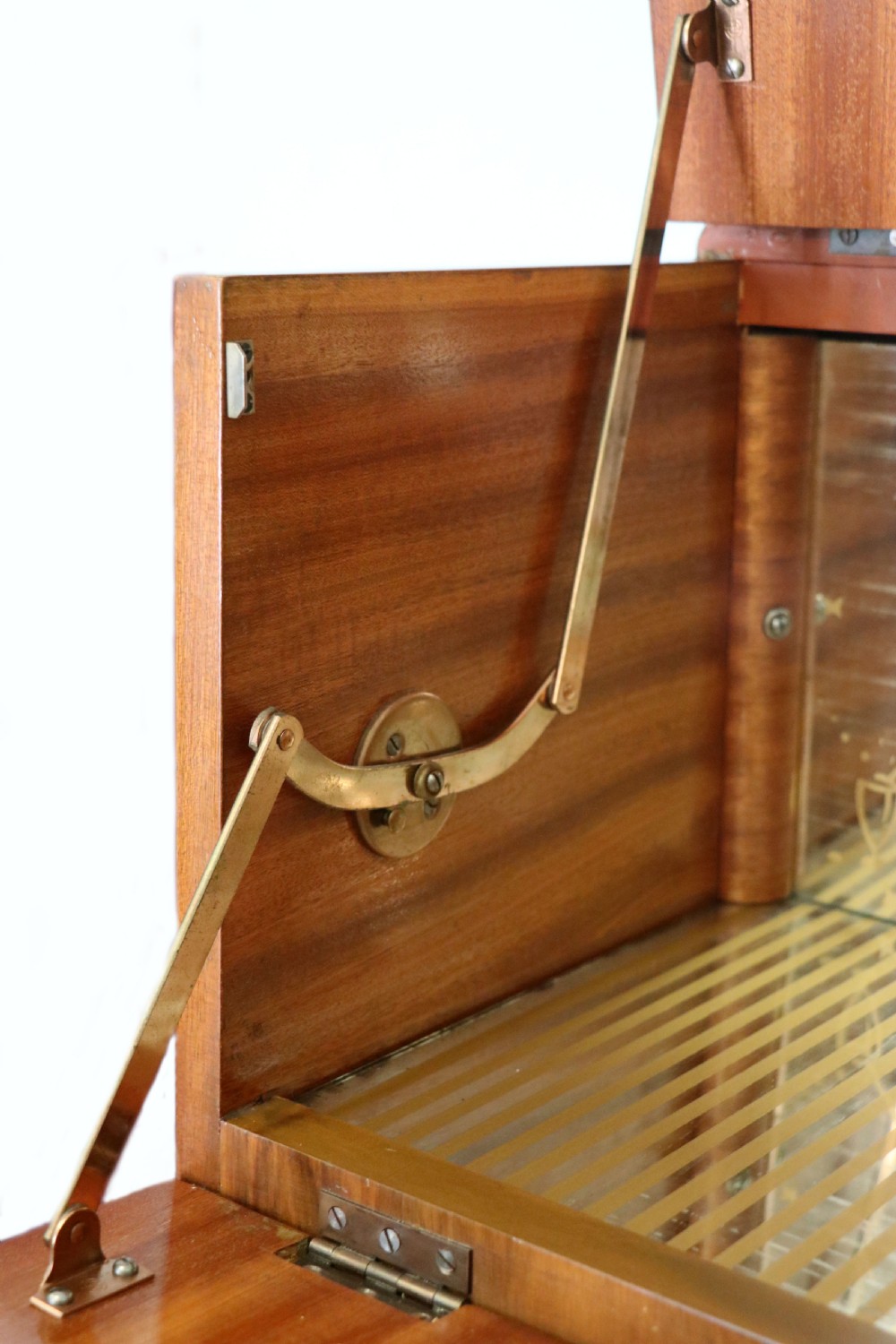 A wonderfully stylish piece of retro furniture An Art Deco walnut and chinoiserie-decorated cabinet by Rivington.  View XIII