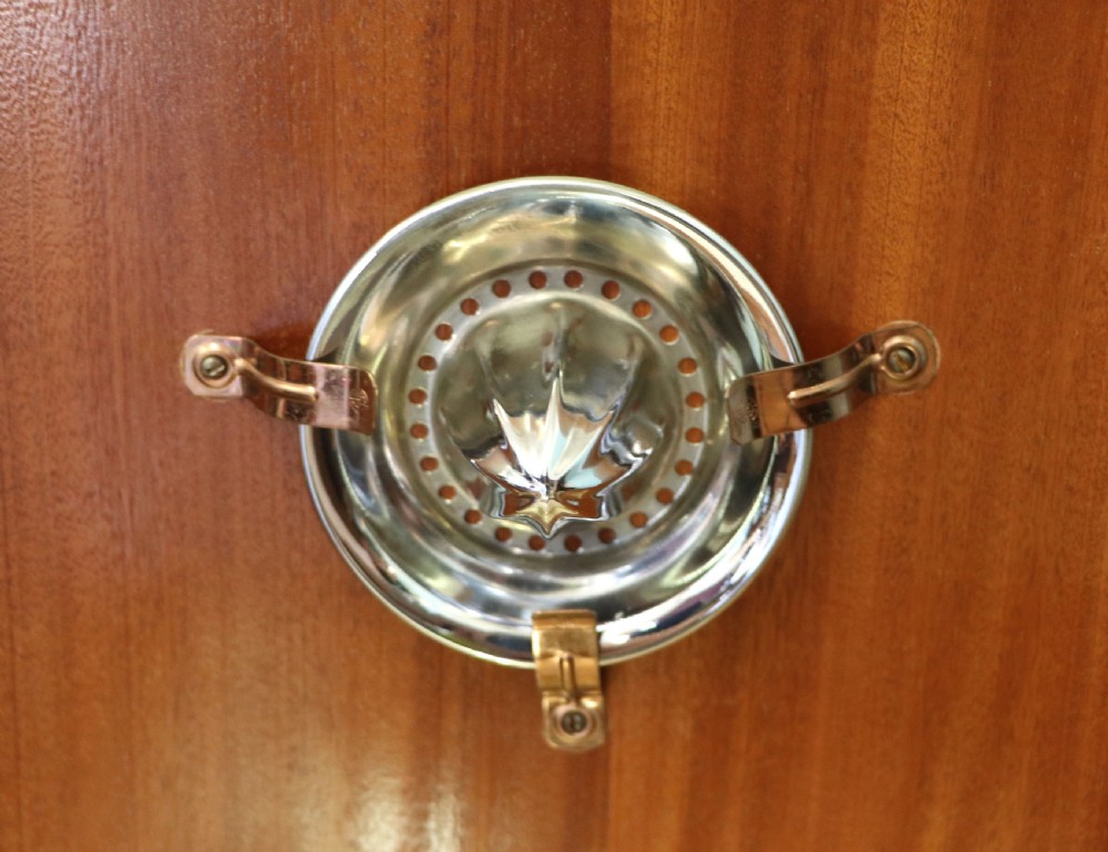 A wonderfully stylish piece of retro furniture An Art Deco walnut and chinoiserie-decorated cabinet by Rivington.  View XIX